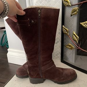 Women”s tall brown UGGs with heal and zipper on the side